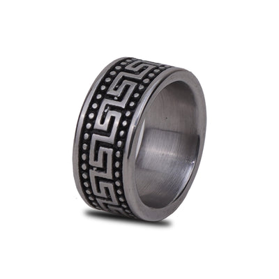 Tungsten ring with black engraved pattern on a white background