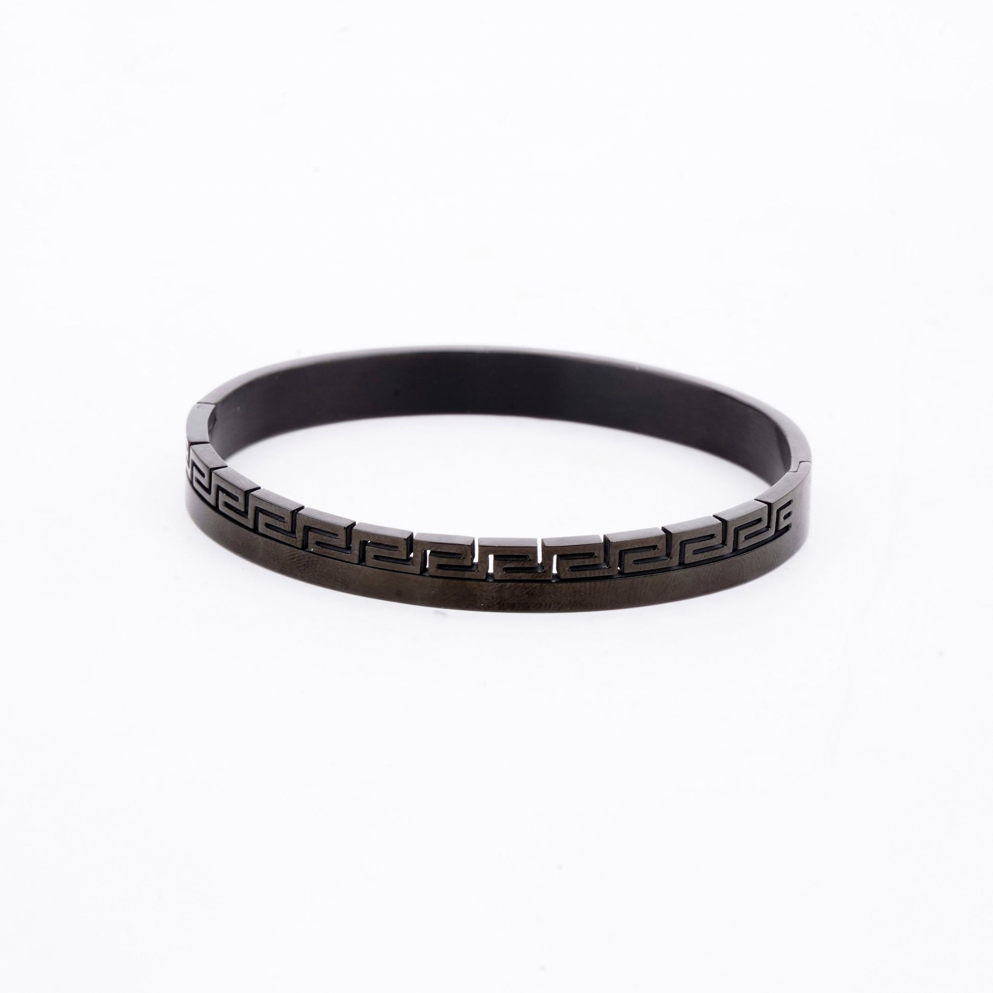 Black bracelet with a pattern on a white background