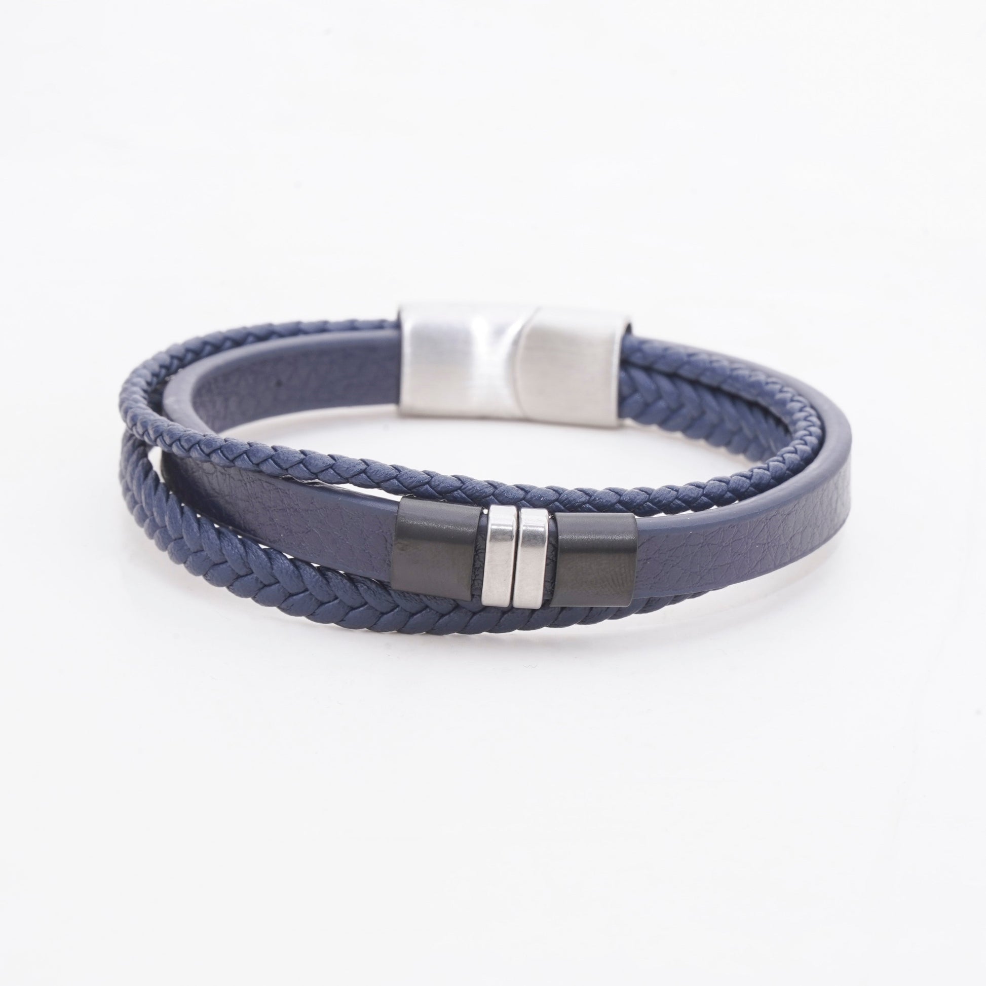 Navy blue braided bracelet with silver magnetic clasp on a white background