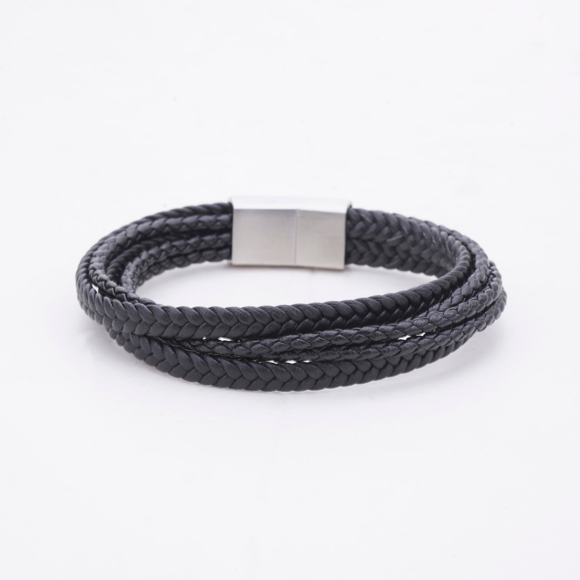 Black braided bracelet with a silver clasp on a white background