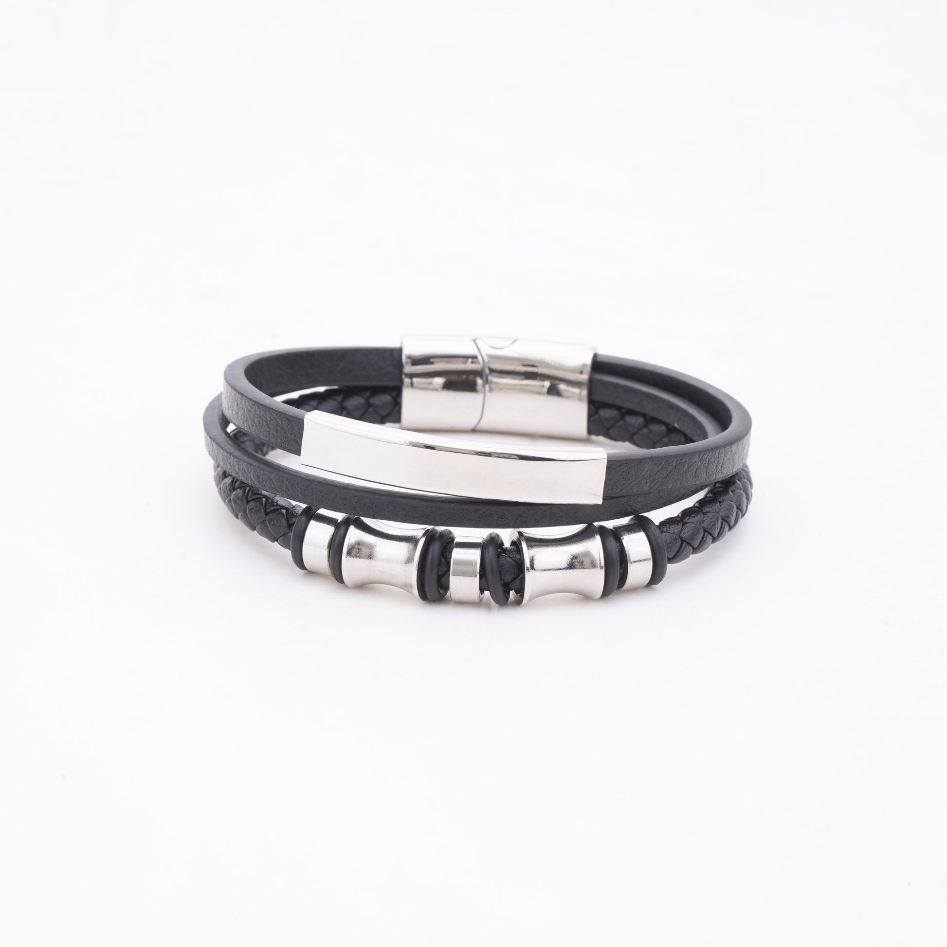 Black leather bracelet with silver accents on a white background